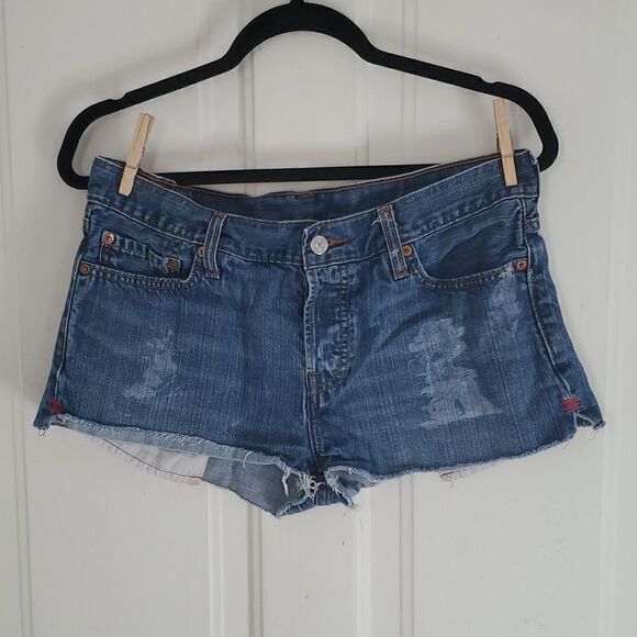 Levi's Cutoff Distressed Jean Shorts - Picture 1 of 12